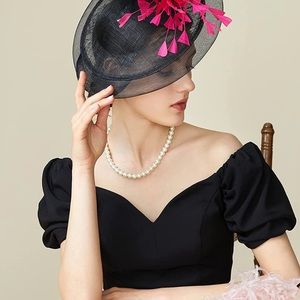 Black fascinator hat with fuchsia accents